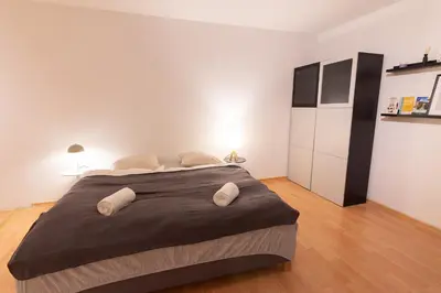 Ein Bett oder Betten in einem Zimmer der Unterkunft Zweisam am Alaunpark