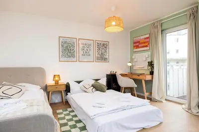 Ein Bett oder Betten in einem Zimmer der Unterkunft Staytime - Mira Suite I TOP Location I Balcony