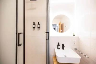 Ein Badezimmer in der Unterkunft Staytime - Mira Suite I TOP Location I Balcony