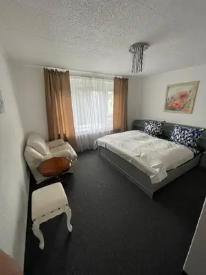 Ein Bett oder Betten in einem Zimmer der Unterkunft Nussknackerstube