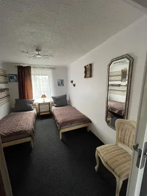 Ein Bett oder Betten in einem Zimmer der Unterkunft Nussknackerstube