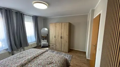 Ein Bett oder Betten in einem Zimmer der Unterkunft Charmante Unterkunft im Herzen von Radebeul mit kostenfreien Parkplatz