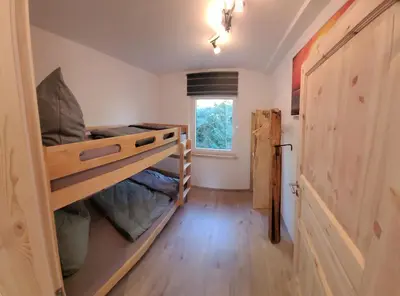 Ein Bett oder Betten in einem Zimmer der Unterkunft Ferienappartement Talblick