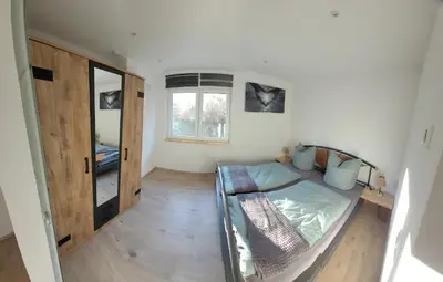 Ein Bett oder Betten in einem Zimmer der Unterkunft Ferienappartement Talblick