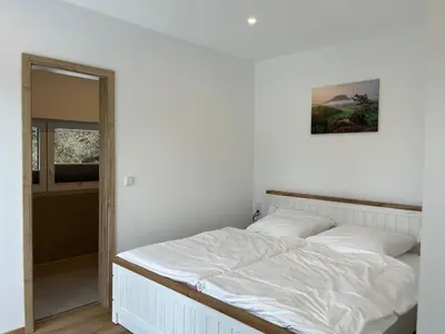 Ein Bett oder Betten in einem Zimmer der Unterkunft 4-Steine-Blick, Wohnung 3