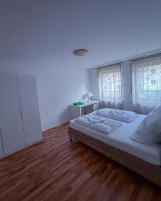 Ein Bett oder Betten in einem Zimmer der Unterkunft Wohnung am Hauptbahnhof