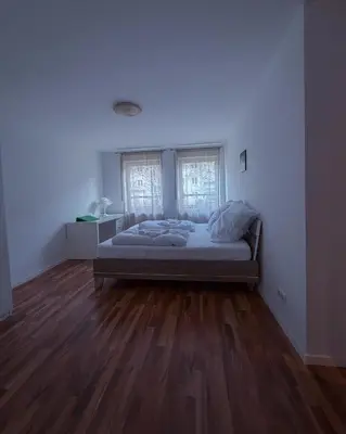 Ein Bett oder Betten in einem Zimmer der Unterkunft Wohnung am Hauptbahnhof