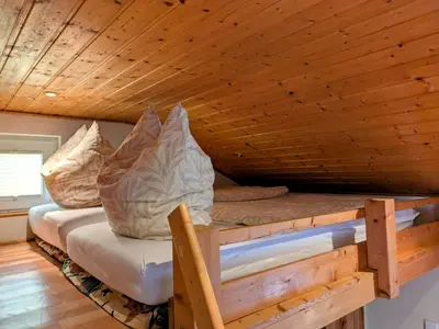 Ein Bett oder Betten in einem Zimmer der Unterkunft Ferienwohnung, Tiny House, Weißeritztäler, Wandern & Radfahren