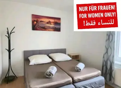 Ein Bett oder Betten in einem Zimmer der Unterkunft Comfortable room in a quiet apartment, exclusively for women