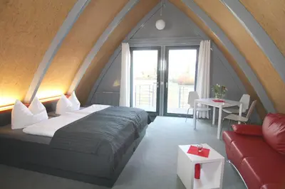 Ein Bett oder Betten in einem Zimmer der Unterkunft Gästehaus am Lausitzring