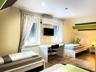 Ein Bett oder Betten in einem Zimmer der Unterkunft Zimmer & Ferienwohnung Steuer