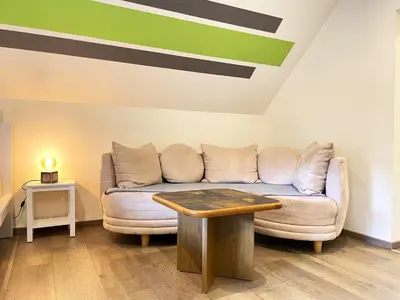 Ein Sitzbereich in der Unterkunft Zimmer & Ferienwohnung Steuer