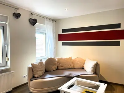 Ein Sitzbereich in der Unterkunft Zimmer & Ferienwohnung Steuer