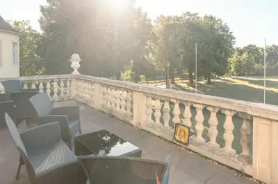 Ein Balkon oder eine Terrasse in der Unterkunft Hotel garni Schloss Grochwitz
