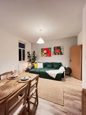 Ein Bett oder Betten in einem Zimmer der Unterkunft Liebe Wohnung Pension