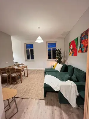 Ein Sitzbereich in der Unterkunft Liebe Wohnung Pension