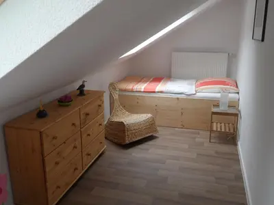 Ein Bett oder Betten in einem Zimmer der Unterkunft Ferienwohnung an der Therme