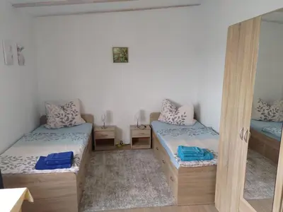 Ein Bett oder Betten in einem Zimmer der Unterkunft Apartment Nette Wohnung in Großsteinberg mit Grill und Terrasse by Interhome