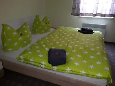 Ein Bett oder Betten in einem Zimmer der Unterkunft Holiday Home Lilienstein by Interhome