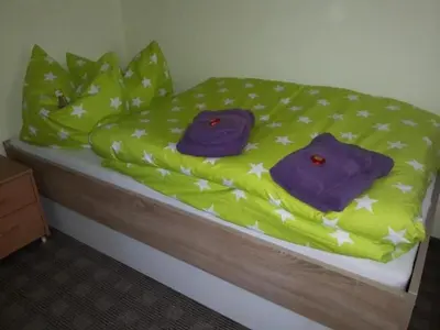 Ein Bett oder Betten in einem Zimmer der Unterkunft Holiday Home Lilienstein by Interhome
