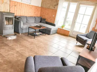 Ein Sitzbereich in der Unterkunft Apartment Gemütliche Wohnung in Niederpoyritz mit Garten by Interhome