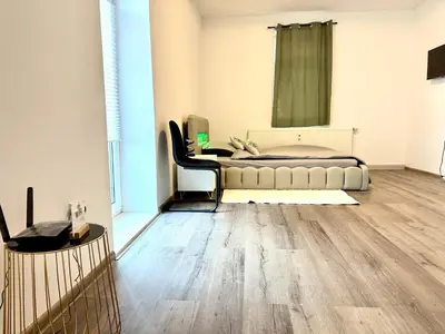 Ein Sitzbereich in der Unterkunft Aparthotel mit Balkon
