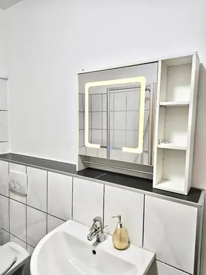 Ein Badezimmer in der Unterkunft Aparthotel mit Balkon