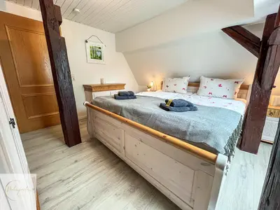 Ein Bett oder Betten in einem Zimmer der Unterkunft Cozy Apartment Rooftop Churchplace