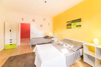 Ein Bett oder Betten in einem Zimmer der Unterkunft Dresden Lofts