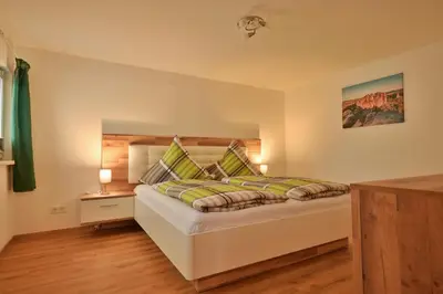 Ein Bett oder Betten in einem Zimmer der Unterkunft Ferienwohnung Wanderlust