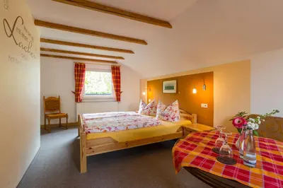 Ein Bett oder Betten in einem Zimmer der Unterkunft Landgasthaus Heiterer Blick