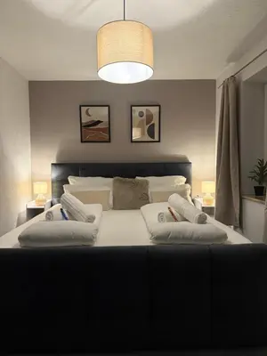 Ein Bett oder Betten in einem Zimmer der Unterkunft MarktQuartier Bad Schandau