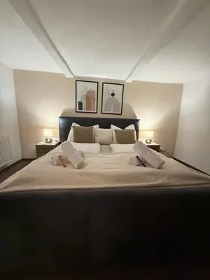 Ein Bett oder Betten in einem Zimmer der Unterkunft MarktQuartier Bad Schandau