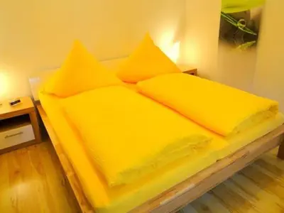 Ein Bett oder Betten in einem Zimmer der Unterkunft Apartment Fewo Ginkgo II by Interhome