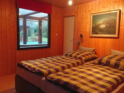 Ein Bett oder Betten in einem Zimmer der Unterkunft Holiday Home in Maxen mit Privatem Pool by Interhome