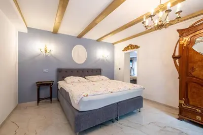 Ein Bett oder Betten in einem Zimmer der Unterkunft Haus Saxonia