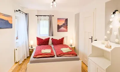 Ein Bett oder Betten in einem Zimmer der Unterkunft HW13-Urlaubsmagie - für bis zu 10P - Gemeinschaftsgarten mit Sauna & Pool
