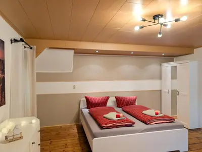 Ein Bett oder Betten in einem Zimmer der Unterkunft HW13-Urlaubsmagie - für bis zu 10P - Gemeinschaftsgarten mit Sauna & Pool