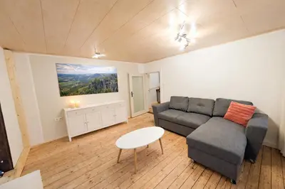 Ein Sitzbereich in der Unterkunft HW13-Urlaubsmagie - für bis zu 10P - Gemeinschaftsgarten mit Sauna & Pool