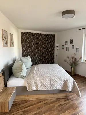 Ein Bett oder Betten in einem Zimmer der Unterkunft Apartment nahe Senftenberger See - Wohnung 2