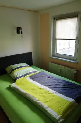 Ein Bett oder Betten in einem Zimmer der Unterkunft Apartment Kleine Ferienwohnung in Freital bei Dresden by Interhome
