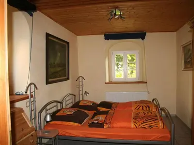 Ein Bett oder Betten in einem Zimmer der Unterkunft Apartment Wohnung mit Terrasse im sanierten Fachwerkhof by Interhome
