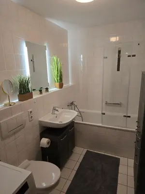 Ein Badezimmer in der Unterkunft WohnTraum Kamelienweg, Sauna, Balkon