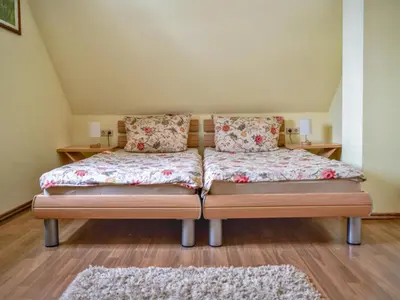 Ein Bett oder Betten in einem Zimmer der Unterkunft Hohnstein