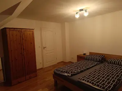 Ein Bett oder Betten in einem Zimmer der Unterkunft Am Altfrankener Park