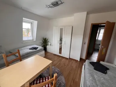 Ein Bett oder Betten in einem Zimmer der Unterkunft Ferienwohnung Unger