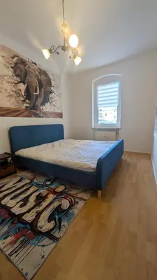 Ein Bett oder Betten in einem Zimmer der Unterkunft Schickes Apartment mit Stil - 58qm groß