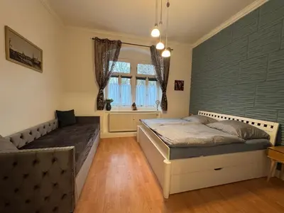 Ein Bett oder Betten in einem Zimmer der Unterkunft Sweet Home Dresden Löbtau one