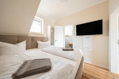 Ein Bett oder Betten in einem Zimmer der Unterkunft Haus Lindolino