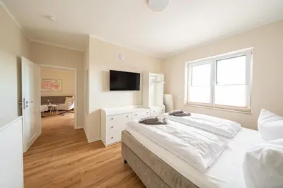 Ein Bett oder Betten in einem Zimmer der Unterkunft Haus Lindolino